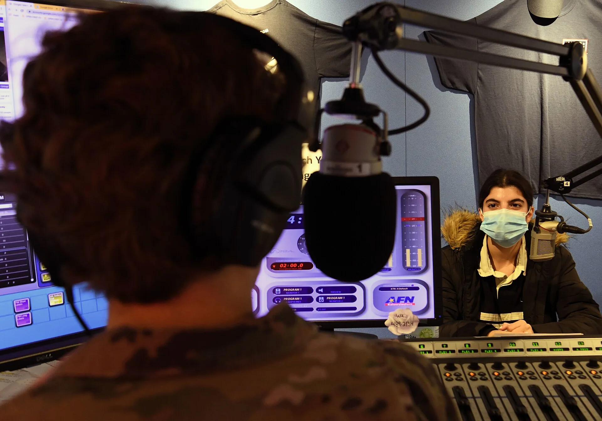 U.S. Air Force Senior Airman Stephanie Gelardo, AFN Kaiserslautern radio broadcaster, engages in an interview during her radio show at AFN Kaiserslautern, Vogelweh Air Base, Germany on October 28, 2021. Gelardo has an integral role in providing news and entertainment to the largest overseas military