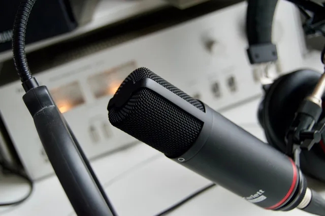 Close-up shot of a microphone in a studio setting, ideal for audio recording. Why a radio advertising launch review needs a written method
