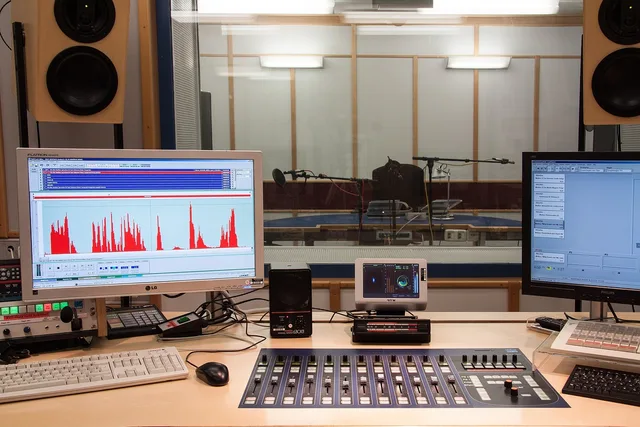 sound studio, speaker cab, director desk, transfer of information, pictures, volume, text, electromagnetic waves, radio network. Buying radio advertising in Manchester's crowded media market